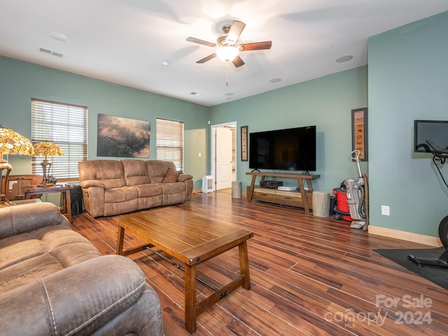 living room with ceiling fan and wood-type flooring