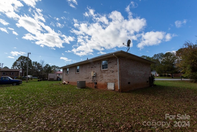 view of home's exterior featuring a lawn