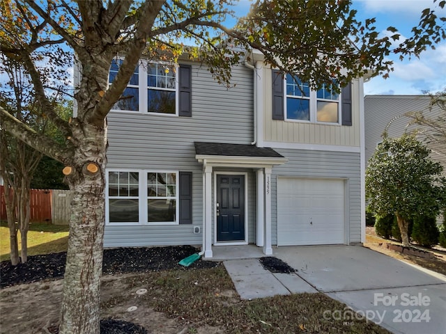 view of front of property featuring a garage