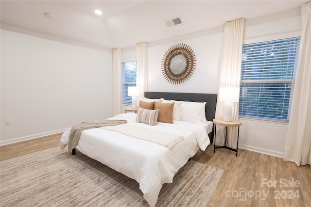 bedroom with light hardwood / wood-style floors