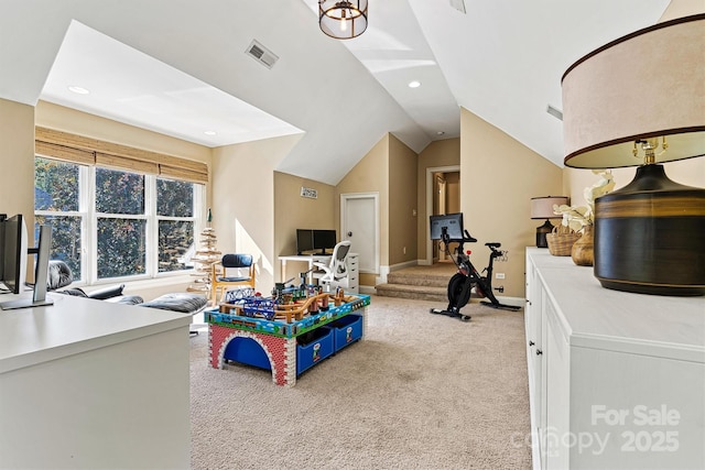 recreation room featuring light colored carpet and vaulted ceiling