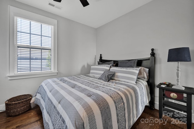 bedroom featuring dark wood-type flooring and ceiling fan