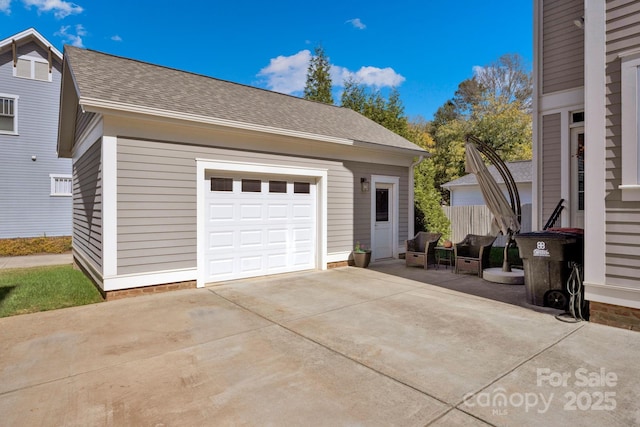 view of home's exterior with an outbuilding and a garage