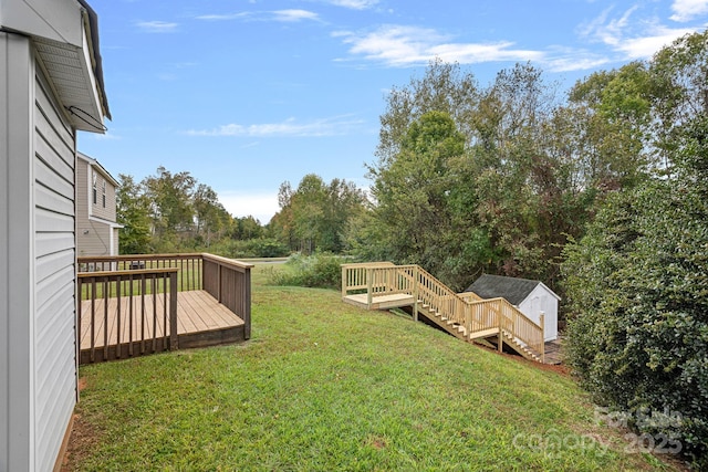 view of yard featuring a wooden deck