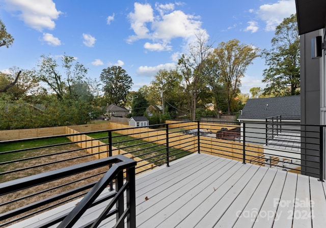 wooden deck with a storage unit