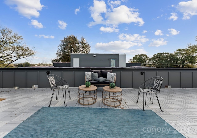 exterior space featuring an outdoor hangout area