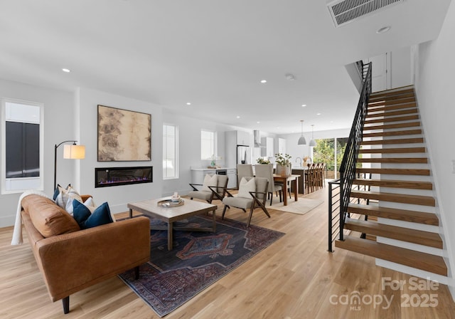 living room featuring light hardwood / wood-style flooring