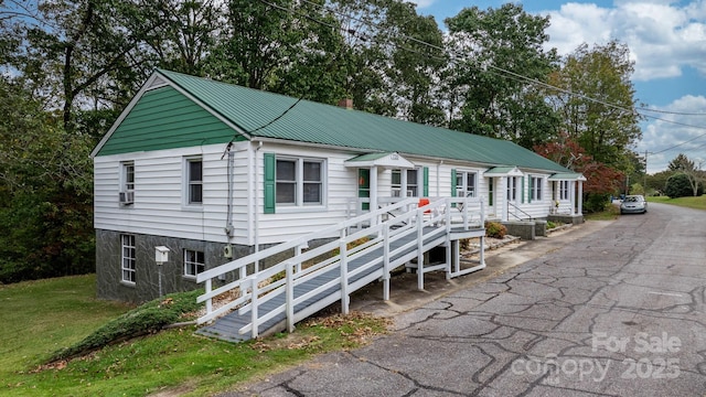 720A-C Harris Ave NW, Valdese, NC 28690 - view of front of home featuring a front lawn and metal roof