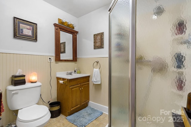 720A-C Harris Ave NW, Valdese, NC 28690 - bathroom with vanity, a stall shower, and wainscoting
