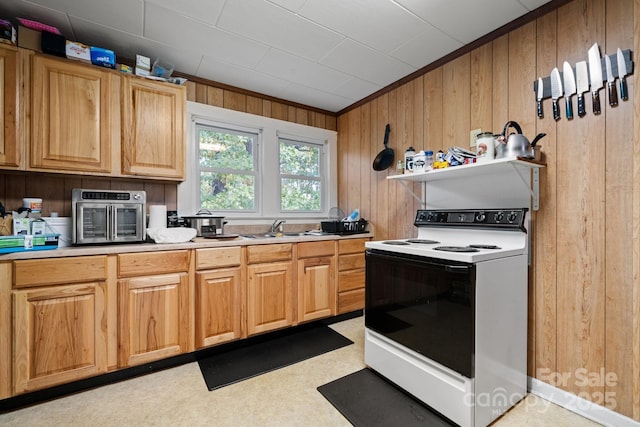 720A-C Harris Ave NW, Valdese, NC 28690 - kitchen featuring electric stove, ornamental molding, wood walls, and a sink