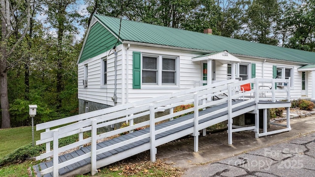 720A-C Harris Ave NW, Valdese, NC 28690 - view of front of house featuring metal roof and a chimney