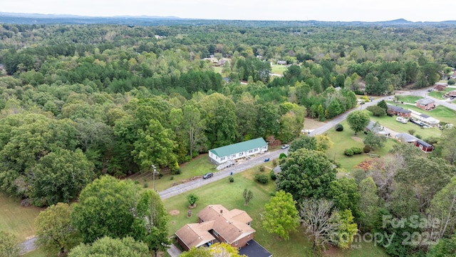 720A-C Harris Ave NW, Valdese, NC 28690 - aerial view featuring a wooded view