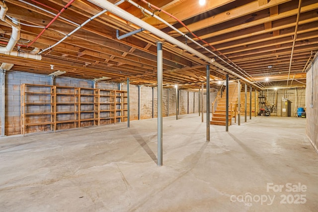 basement featuring electric water heater