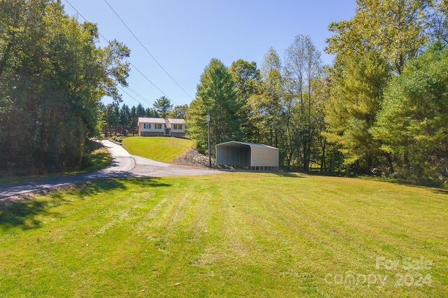 view of yard with a carport