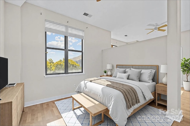 bedroom with light wood-type flooring