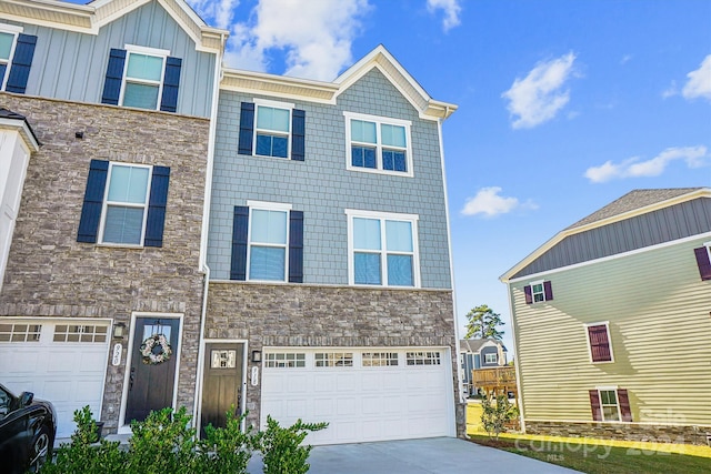 multi unit property featuring a garage