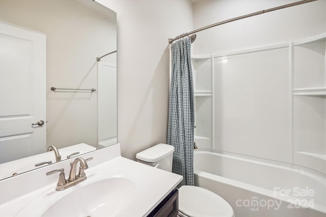 full bathroom featuring toilet, vanity, and shower / tub combo