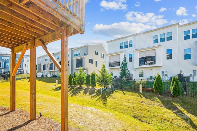 view of yard featuring a balcony