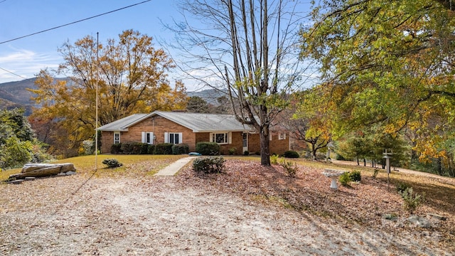 single story home with a mountain view