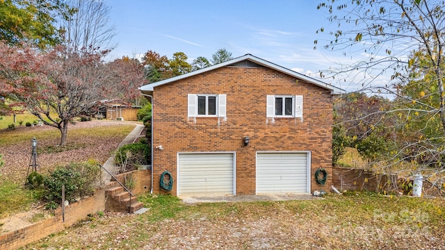 view of home's exterior with a garage