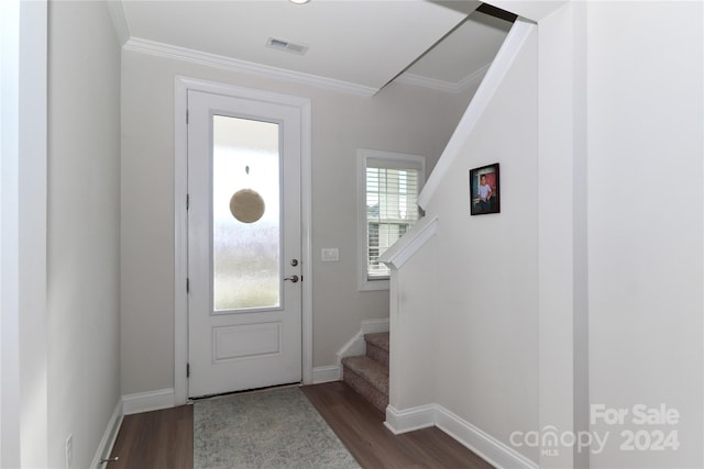 entryway with crown molding and dark hardwood / wood-style flooring