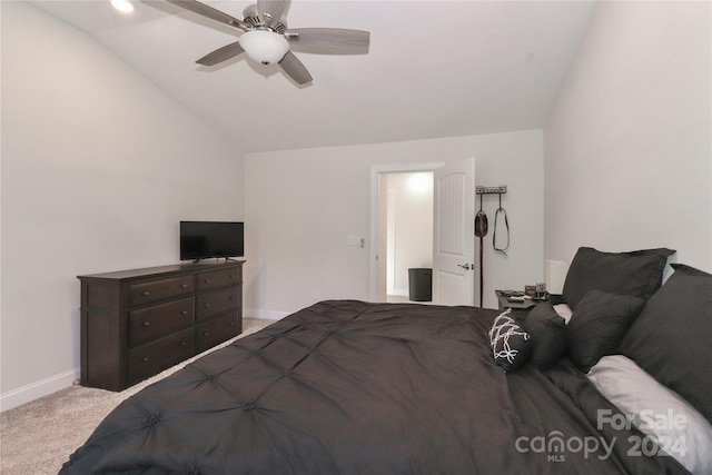 carpeted bedroom with lofted ceiling and ceiling fan