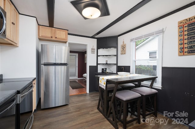 kitchen with light brown cabinets, stainless steel appliances, dark wood-type flooring, and crown molding