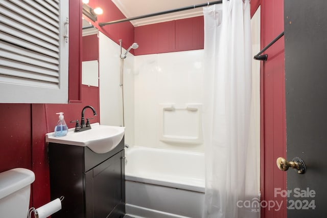 full bathroom featuring vanity, toilet, and shower / bath combination with curtain