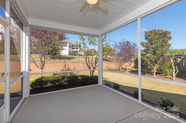 unfurnished sunroom featuring plenty of natural light