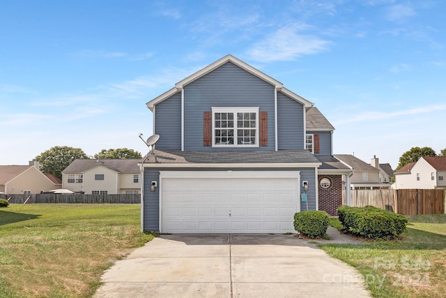 front facade featuring a front yard and a garage