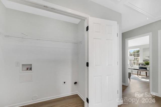 laundry room with hookup for an electric dryer, washer hookup, and dark wood-type flooring