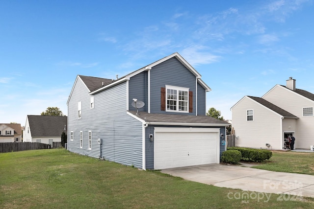 view of property exterior featuring a lawn and a garage