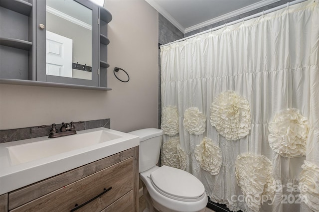 bathroom featuring toilet, vanity, and ornamental molding