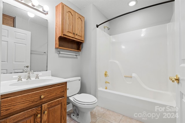 full bathroom with  shower combination, a textured ceiling, toilet, tile patterned floors, and vanity