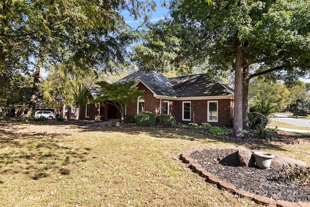 view of front of home with a front yard