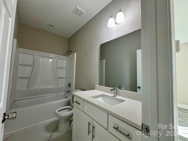 full bathroom featuring vanity, shower / bathing tub combination, and toilet