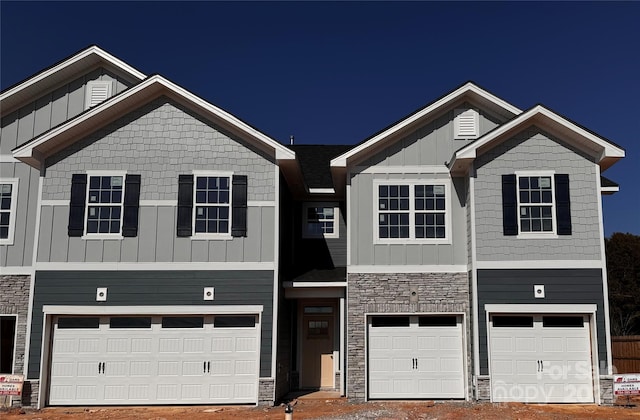 view of front of property with a garage