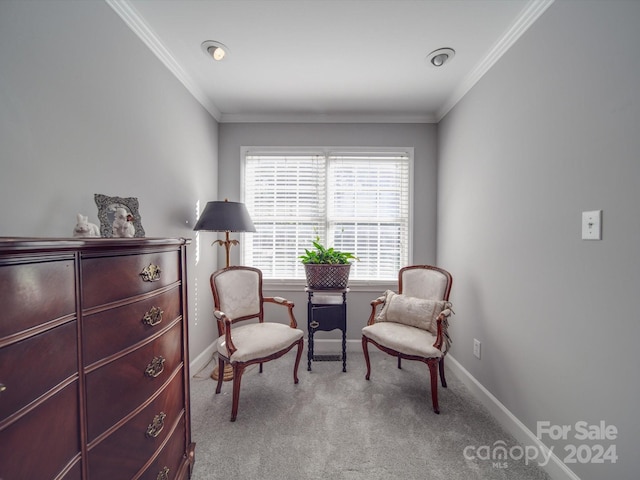 living area with light carpet and crown molding