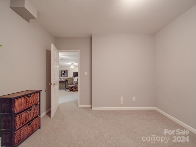 empty room with light colored carpet