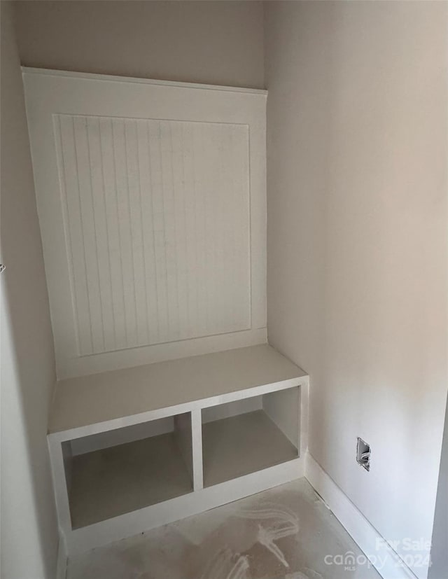 mudroom with concrete flooring