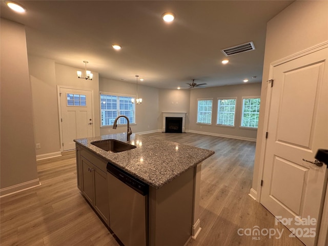 4049 Port Richmond Ave Unit 11, Gastonia, NC 28056 - kitchen with stainless steel dishwasher, baseboards, visible vents, and a sink