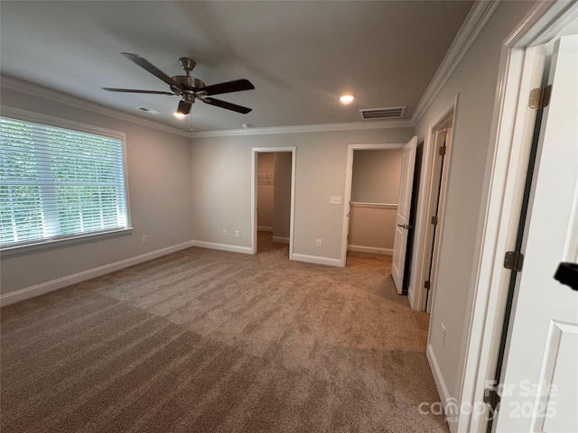4049 Port Richmond Ave Unit 11, Gastonia, NC 28056 - unfurnished bedroom with ornamental molding, visible vents, a spacious closet, carpet flooring, and baseboards