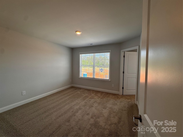 4049 Port Richmond Ave Unit 11, Gastonia, NC 28056 - carpeted spare room featuring baseboards and visible vents