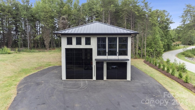 view of outbuilding featuring a yard