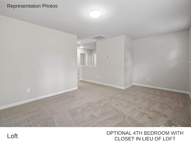 unfurnished room featuring light colored carpet