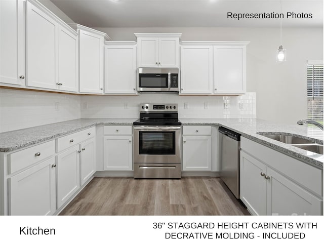 209 Lake George Dr, Shelby, NC 28152 - kitchen with a sink, appliances with stainless steel finishes, decorative backsplash, and white cabinetry