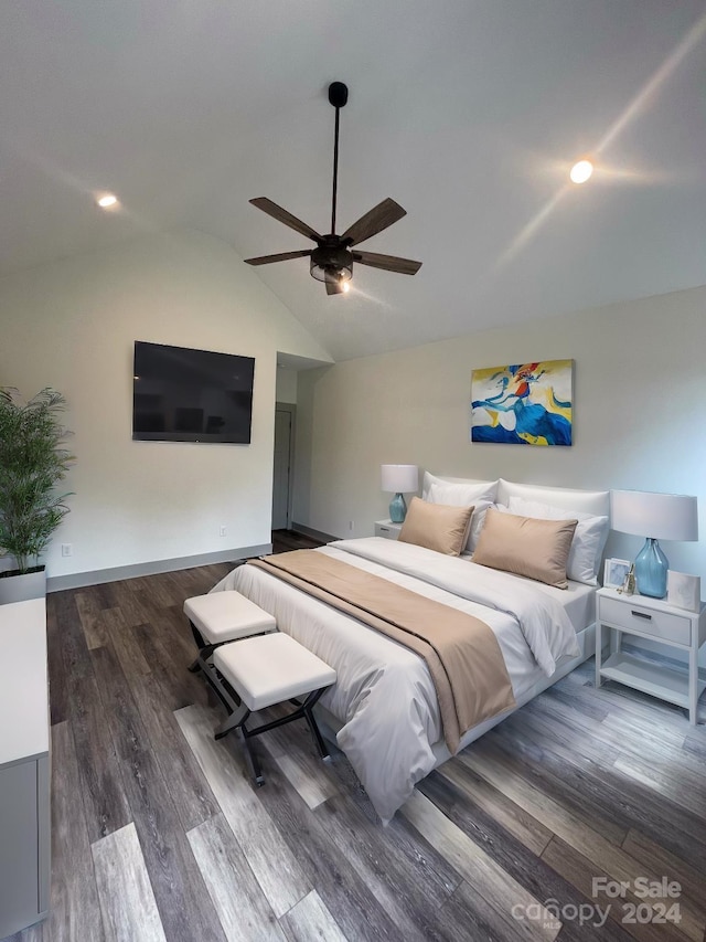 bedroom with dark wood-type flooring, ceiling fan, and vaulted ceiling