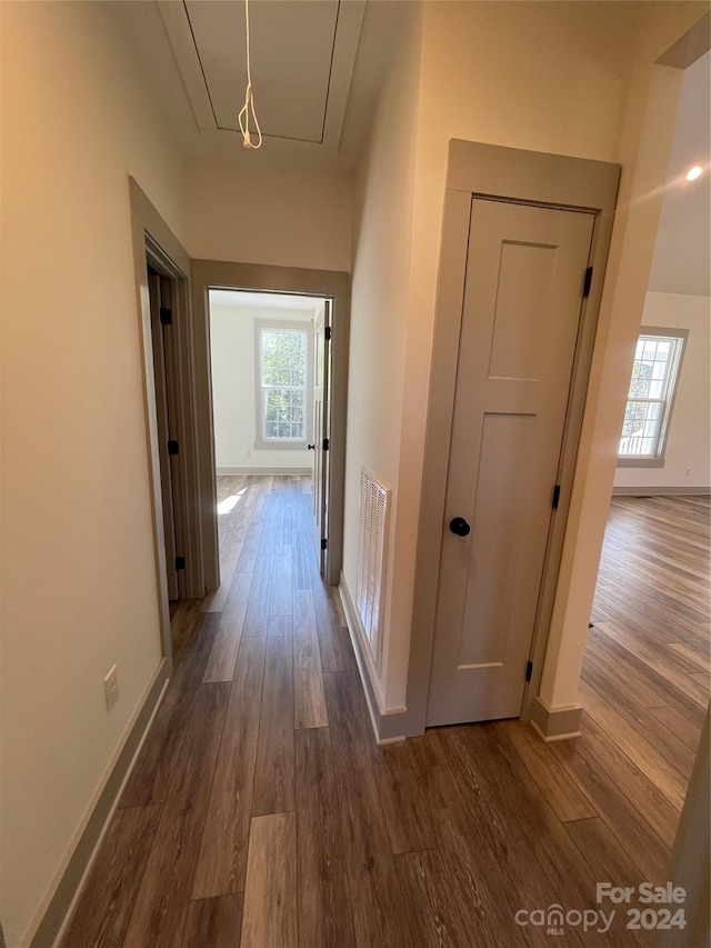 hallway featuring dark hardwood / wood-style floors