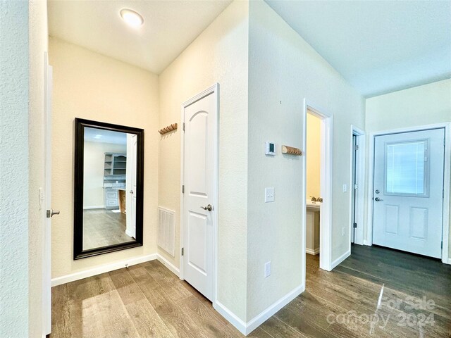 hall featuring hardwood / wood-style flooring