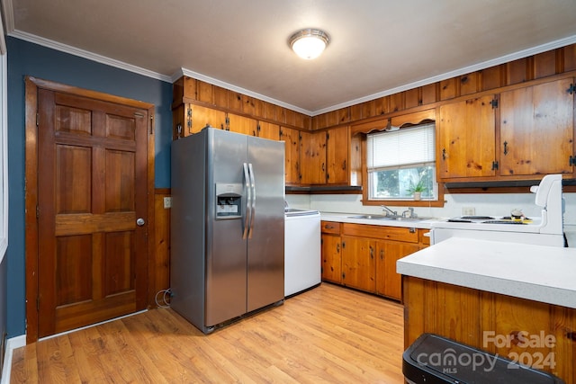 kitchen with stainless steel refrigerator with ice dispenser, white range oven, ornamental molding, sink, and light hardwood / wood-style floors